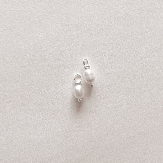 Paire de perles breloques